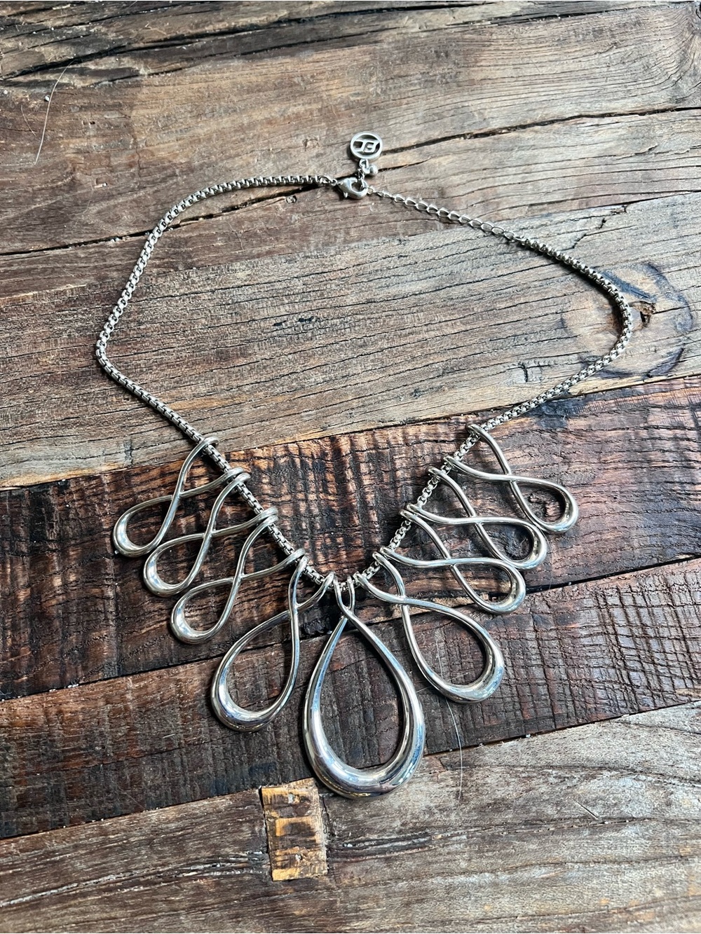 ERICA LYONS NECKLACE INFINITY TEARDROP LOOPS SILVER TONE